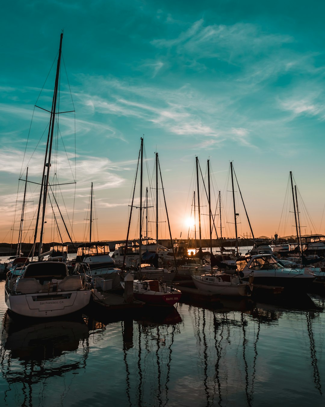 white sailboats under blue sky