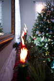 Seasonal celebration scene featuring festive candles illuminating the night.