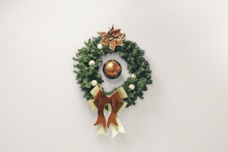 A beautifully crafted Christmas wreath adorned with festive decorations.