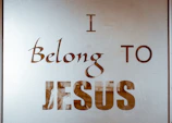A custom vinyl decal on a water bottle with a meaningful faith symbol.