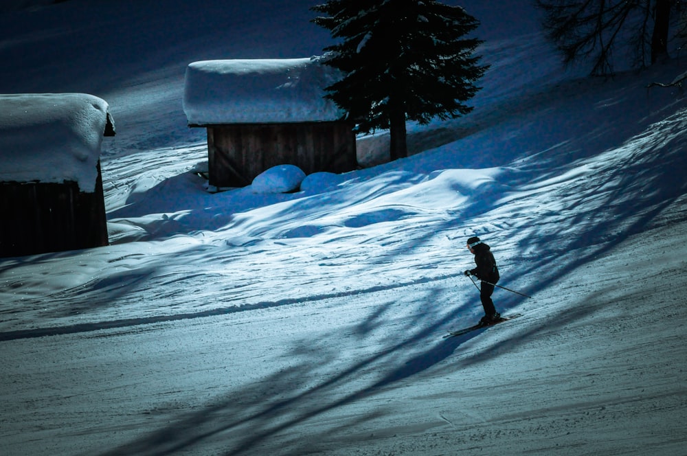 man skiing on snow mountains