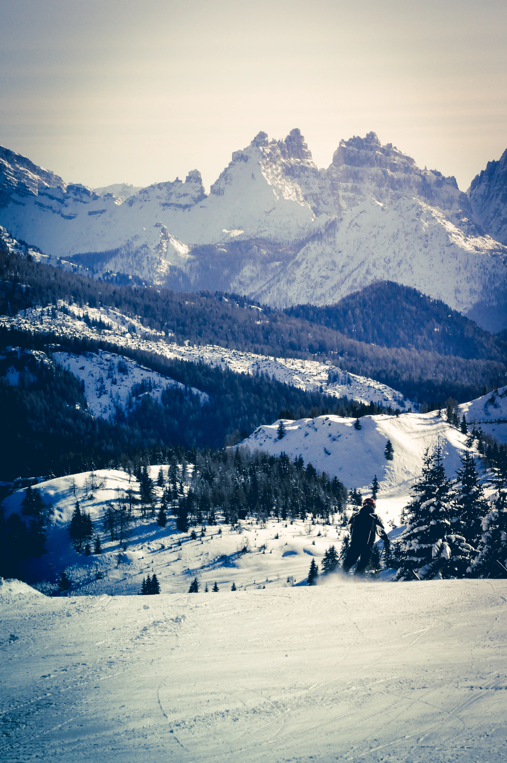 woman wearing yellow long-sleeved dress under white clouds and blue sky during daytime