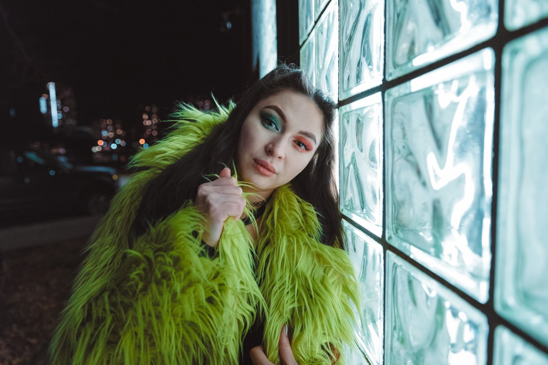 woman wearing green fur top