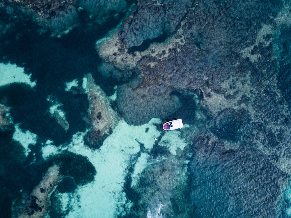 aerial view white boat on sea at daytime