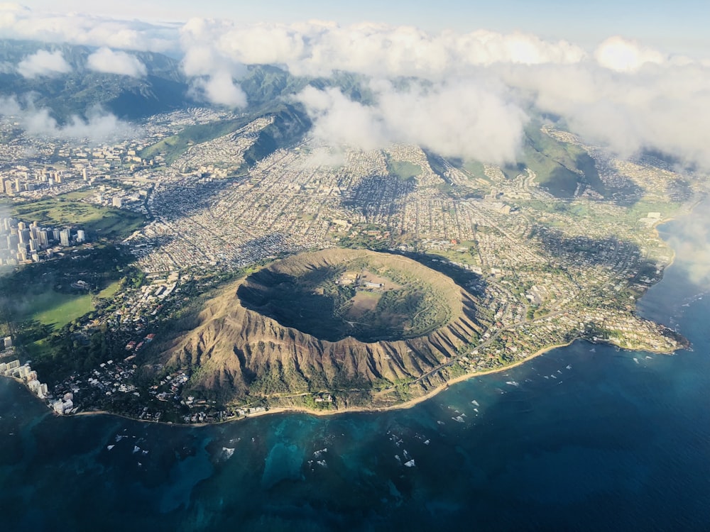 aerial view of mountains and cloudy sky