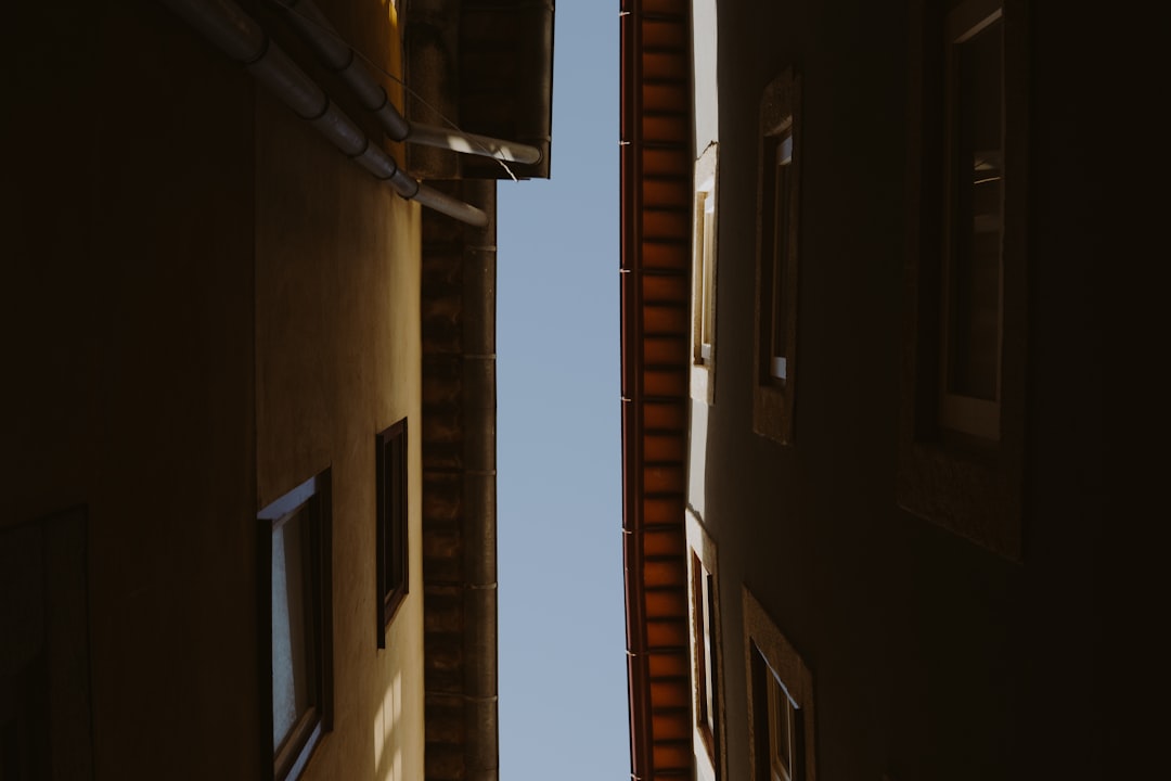 bottom view of two buildings, Above is the Sky