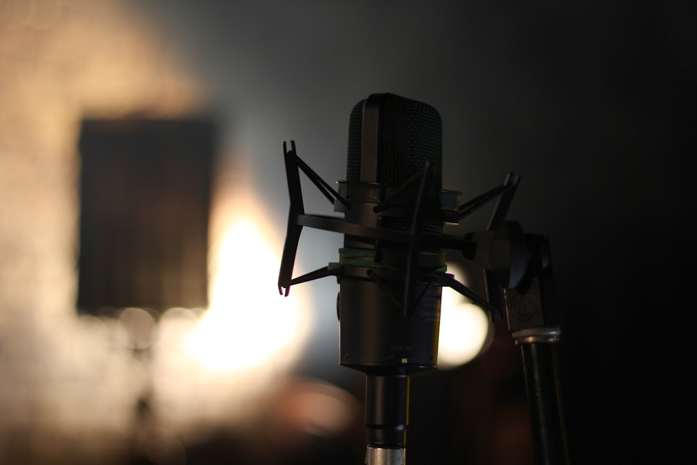 shallow focus photography of black studio microphone