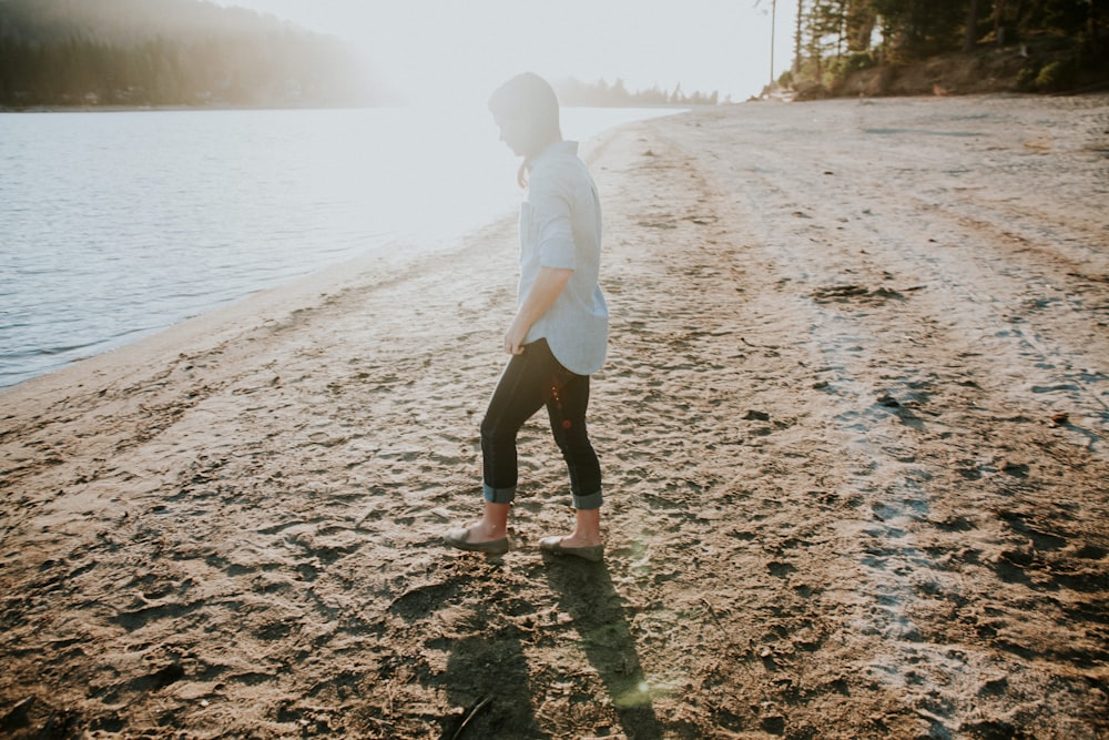 person beside seashore