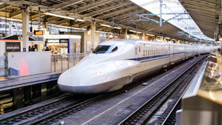 time lapse photography of white train