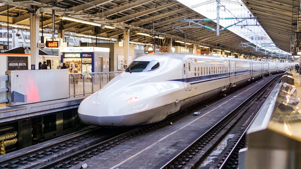 time lapse photography of white train