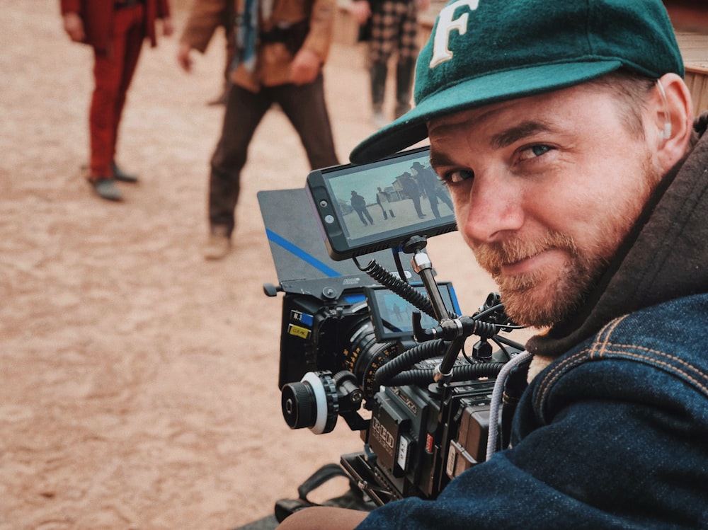 man in front of video recorder