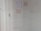 A wall covered in various handwritten motivational quotes and notes. Some quotes are attributed to notable personalities and focus on themes like persistence, success, and self-belief. There are drawings and scribbles, including diagrams and small notes, emphasizing hard work and dedication.