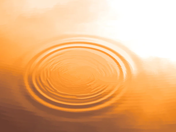 circular ripples in orange water