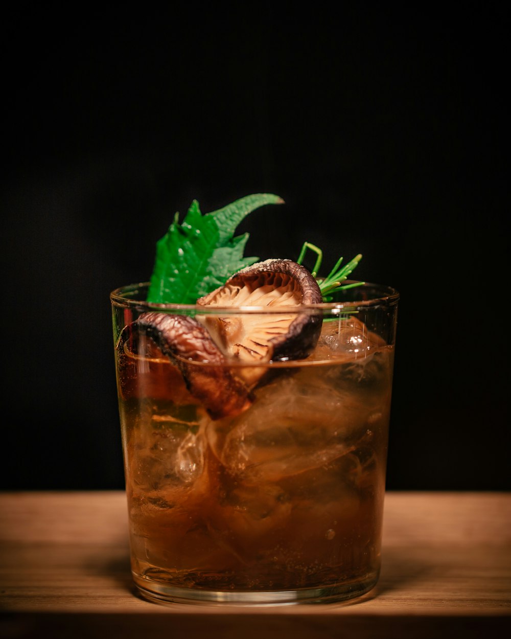 brown mushroom on drinking glass