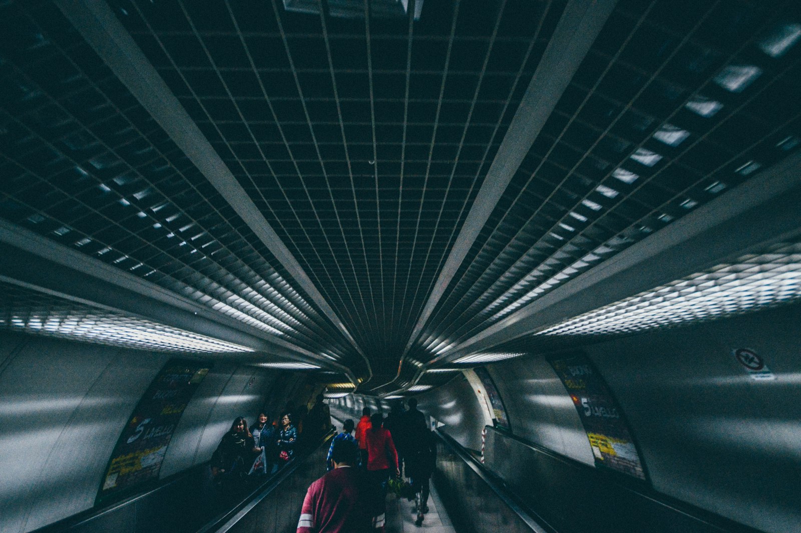 Nikon D3200 + Sigma 10-20mm F4-5.6 EX DC HSM sample photo. People riding on escalator photography