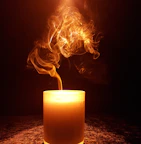 Close-up of a lit soy candle with gentle smoke rising, surrounded by soft pastel fabrics