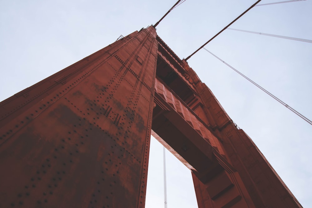 low angle photo of suspension bridge