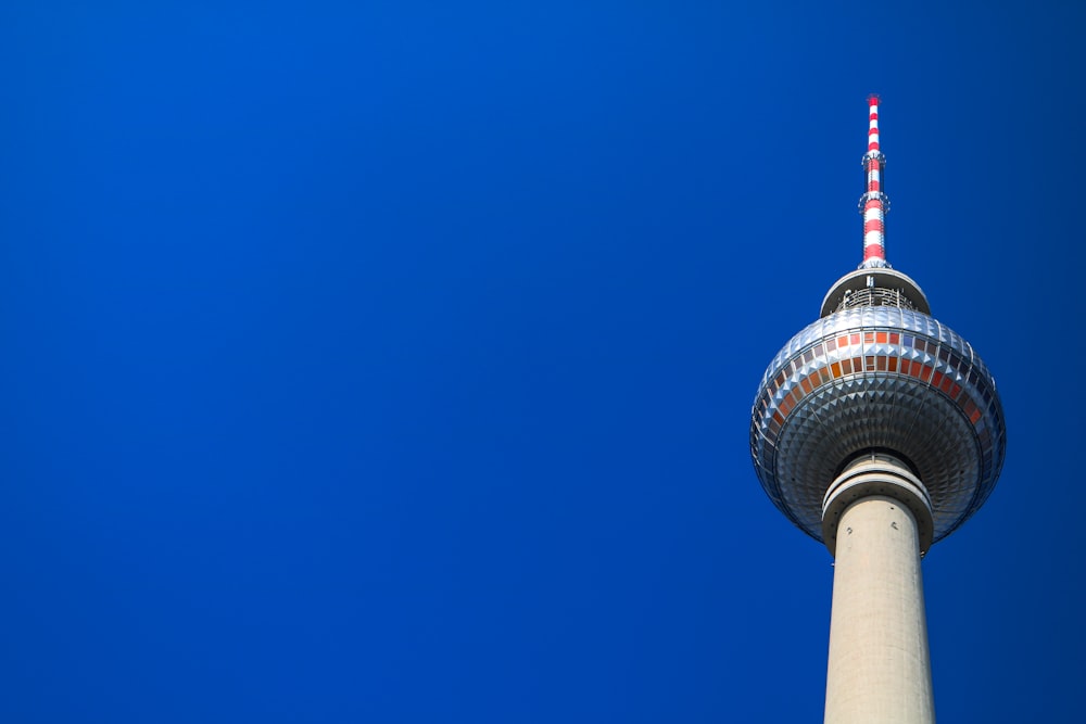 white and gray tower under blue sky