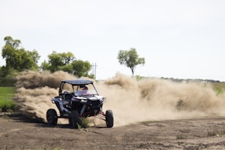 drifting UTV at the field during day