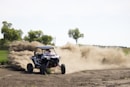 drifting UTV at the field during day