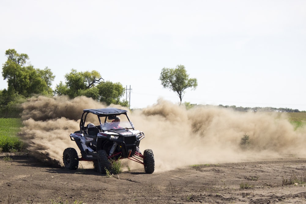 drifting UTV at the field during day
