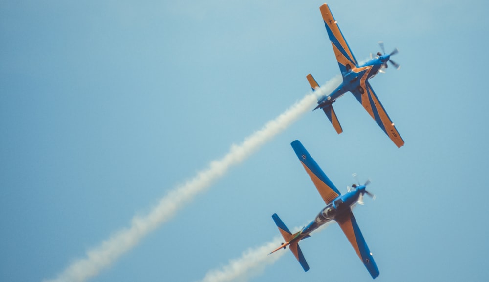 two monoplanes flying