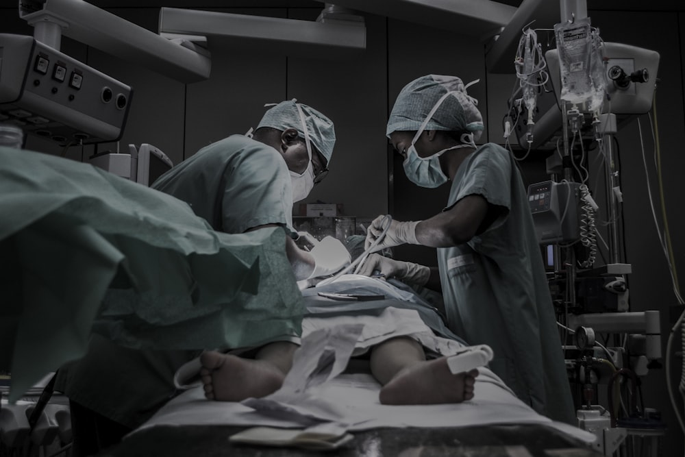 doctors treating patient