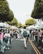 people walking on walkway during daytime