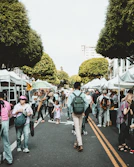 people walking on walkway during daytime