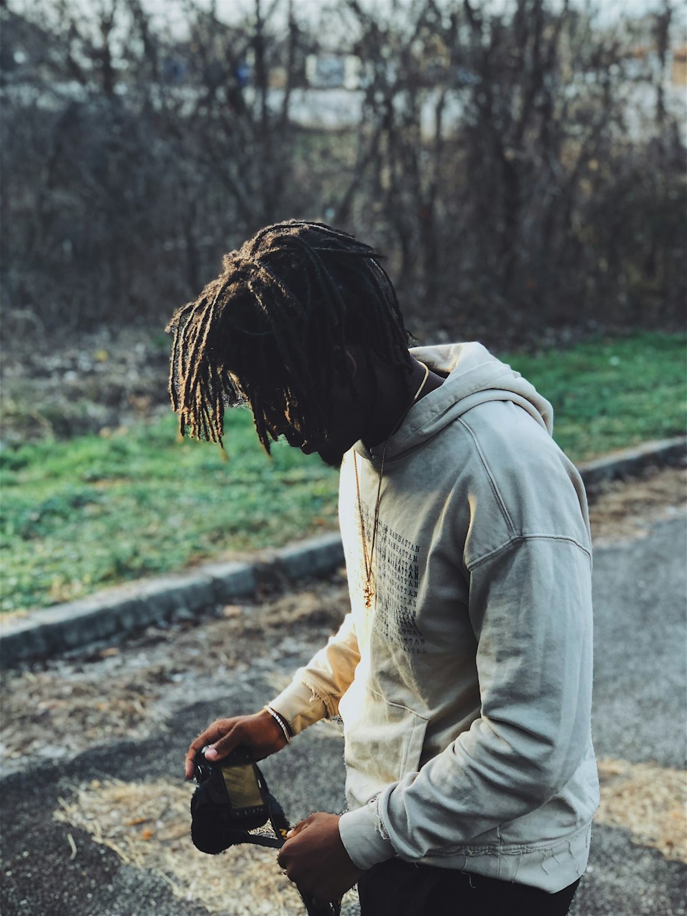 man wearing white pullover hoodie