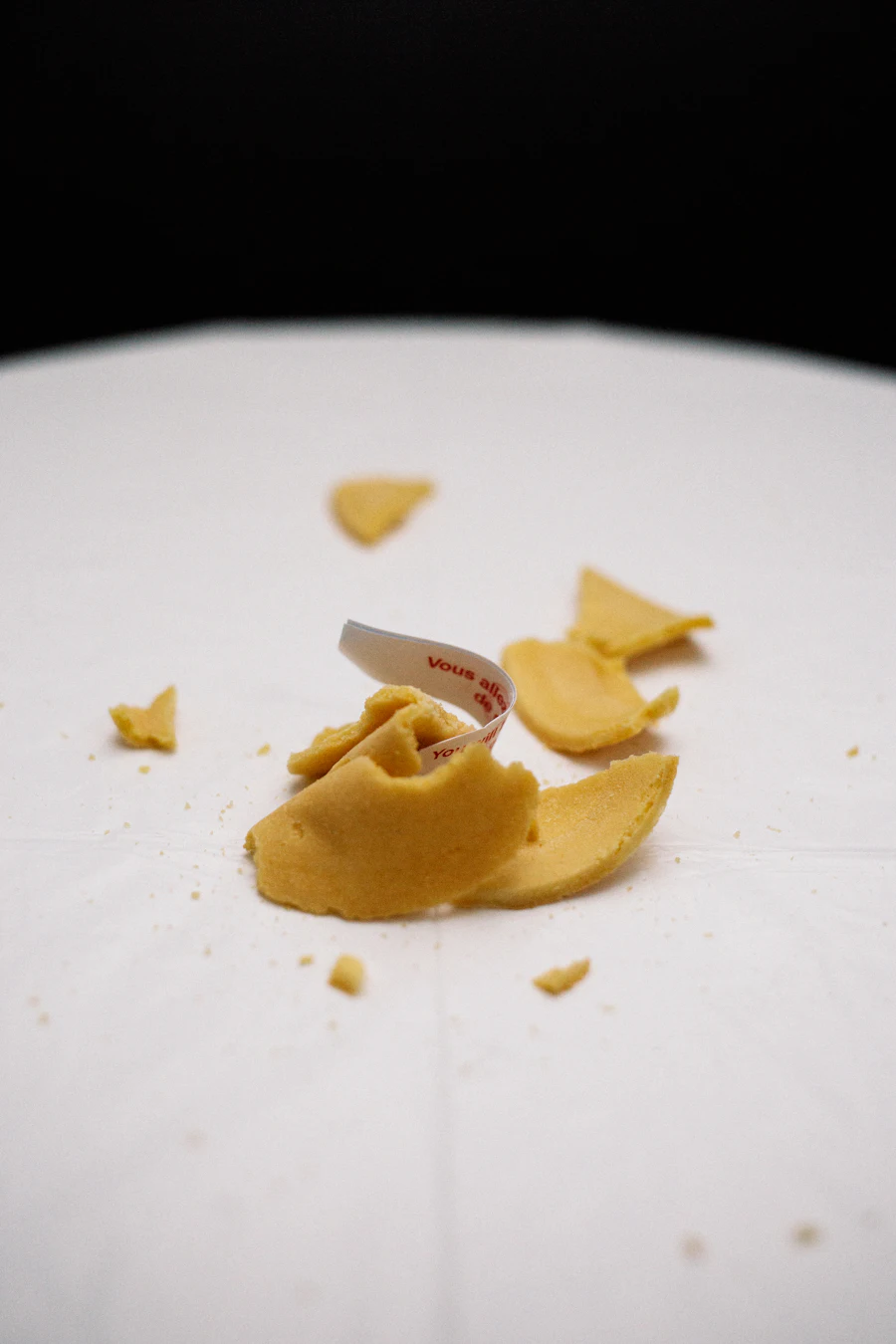 Crispy fried noodles scattered on a white surface