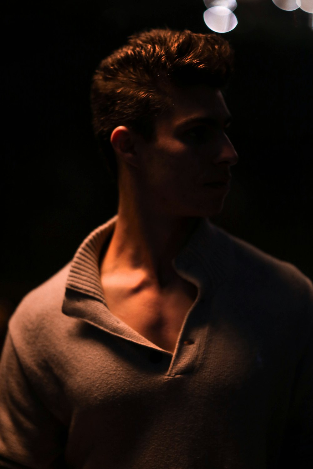 man in brown polo shirt portrait photo