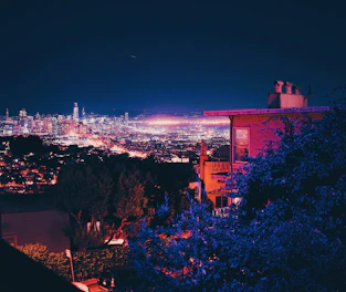 Before and after images of a downtown area revitalized by ShineCity Pros.