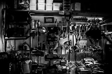 grayscale photography of metal tools