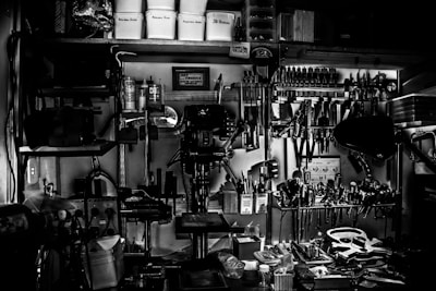 grayscale photography of metal tools