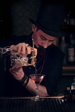 man pouring the wine glass