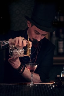 man pouring the wine glass