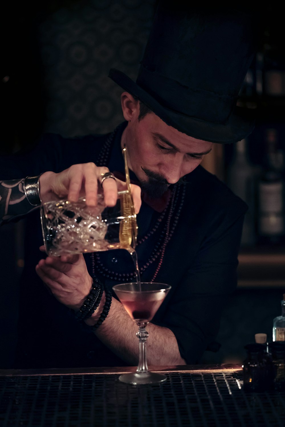 man pouring the wine glass