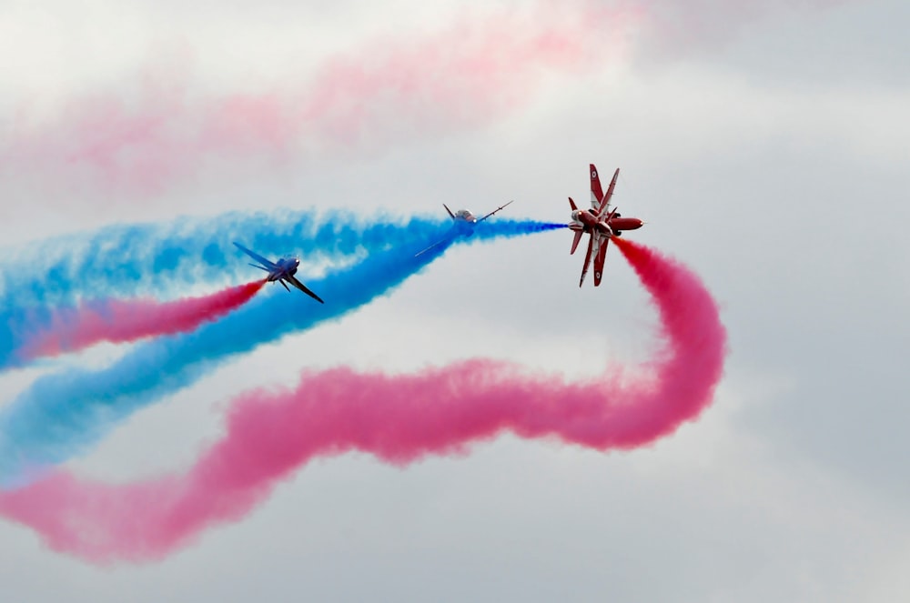 three planes doing aerobatics