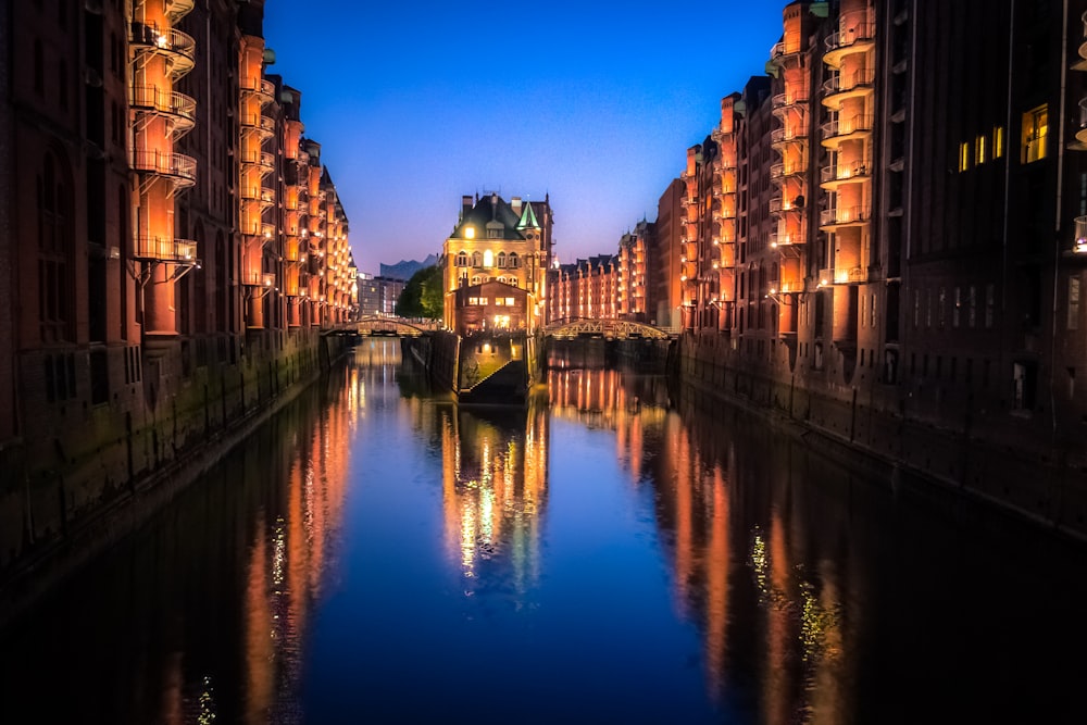 river in the middle of buildings