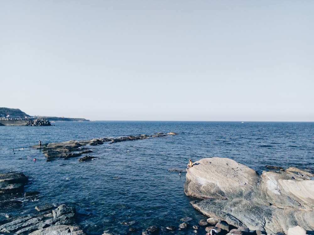 sea and stone at daytime