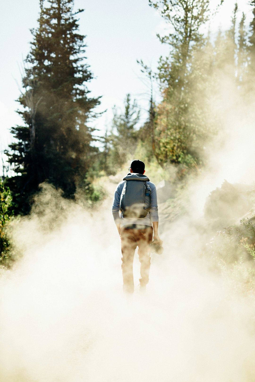 man standing with smokes