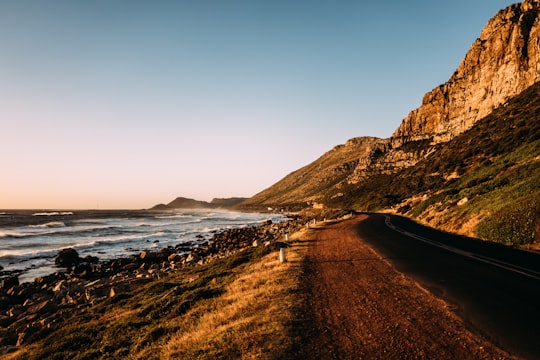 road between sea and mountain in Cape Peninsula South Africa