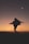 silhouette of woman running during golden hour