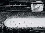 ice hockey players on ice hockey arena