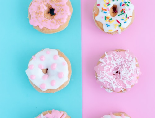 six assorted-flavor doughnuts
