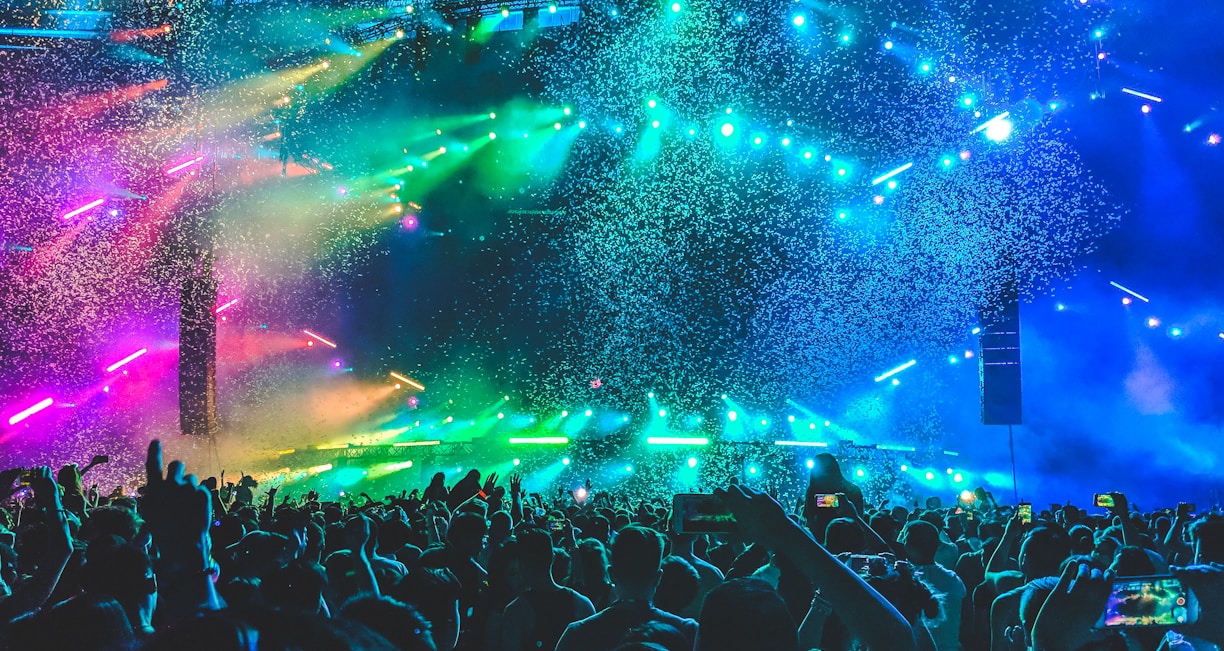 group of people in front of stage