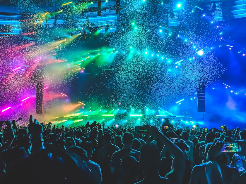 Concert crowd with colorful stage lighting