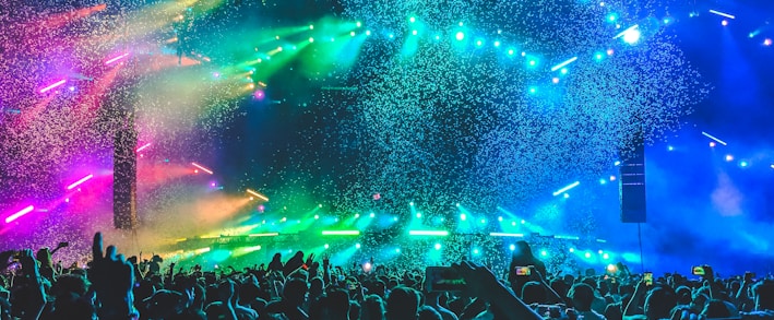 group of people in front of stage