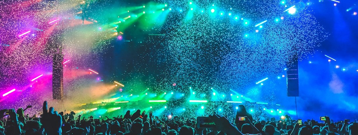 group of people in front of stage